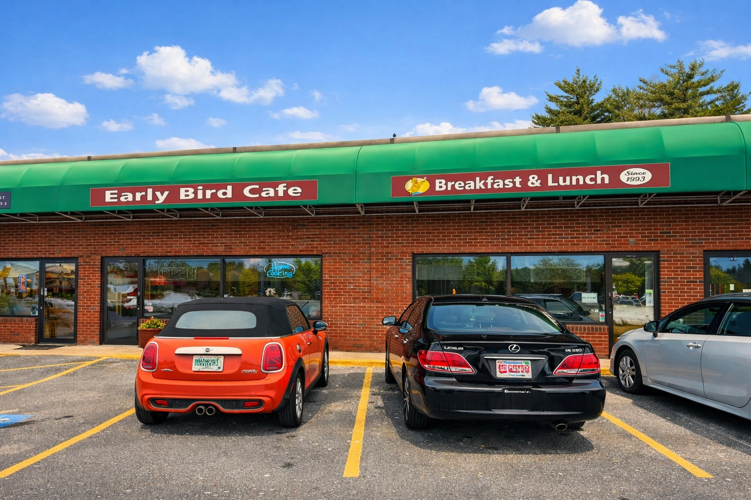 Early Bird Cafe exterior with green awnings and signage on Route 125 in Plaistow NH